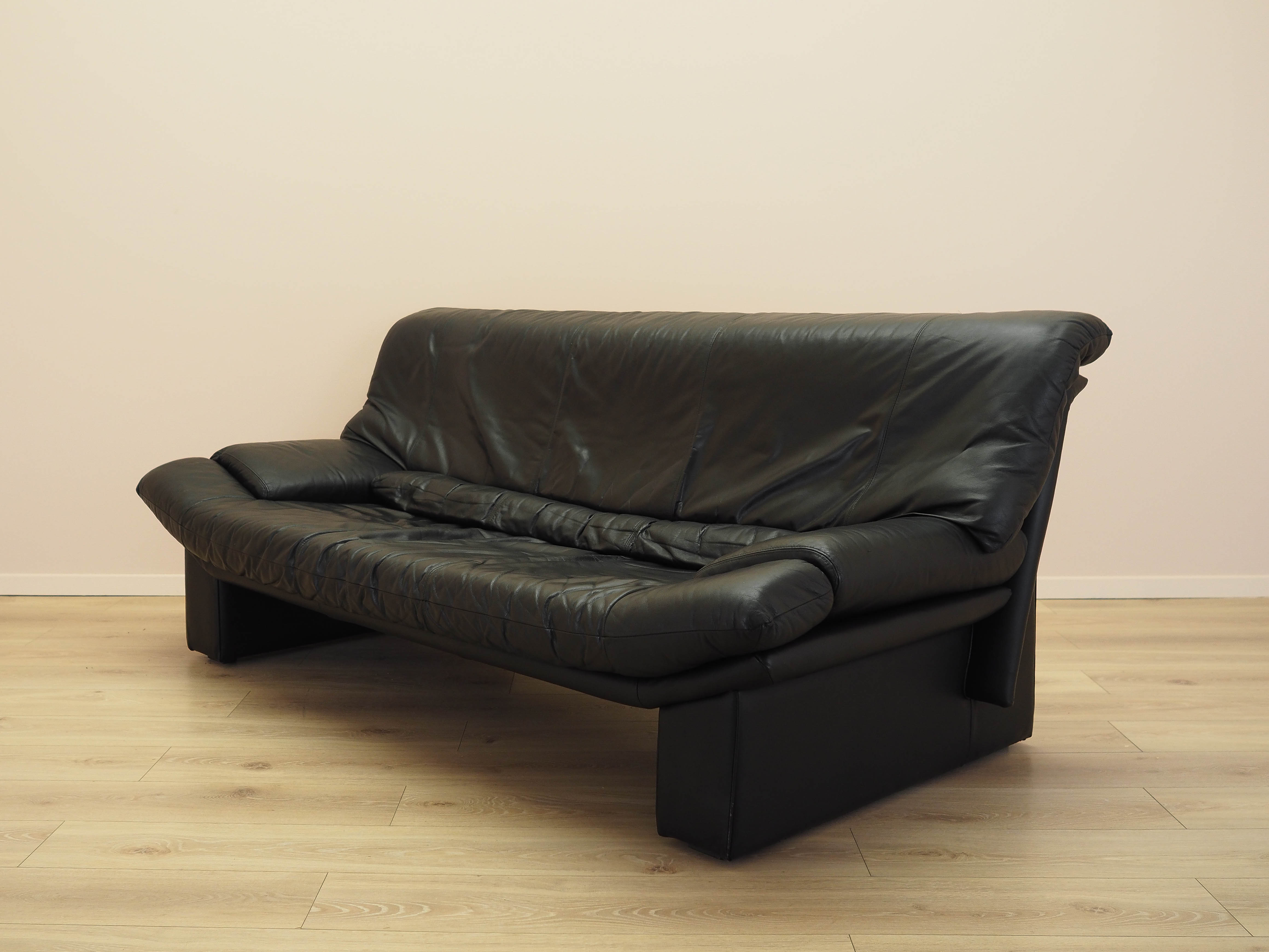 Black leather sofa 1960s