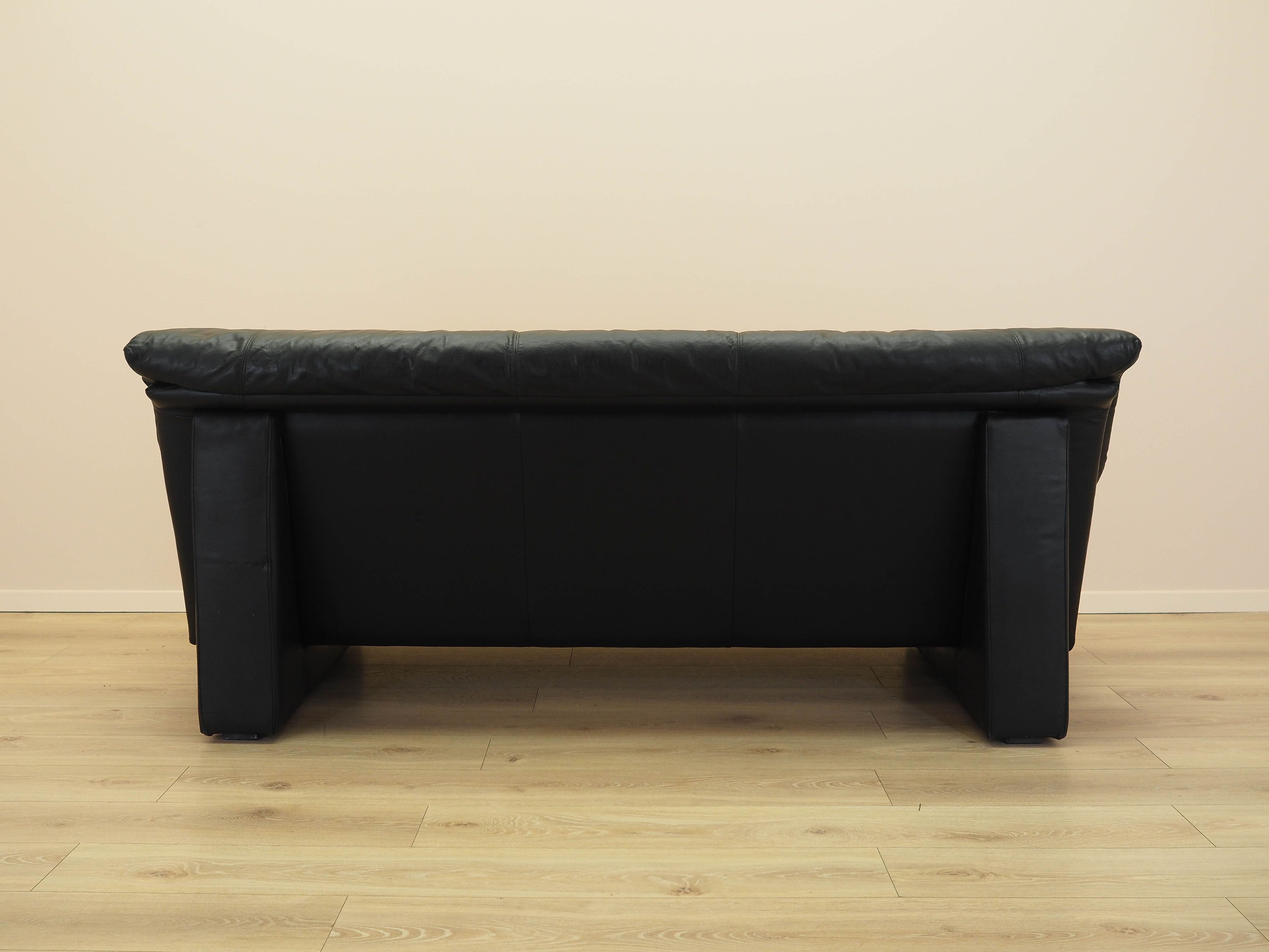 Black leather sofa 1960s