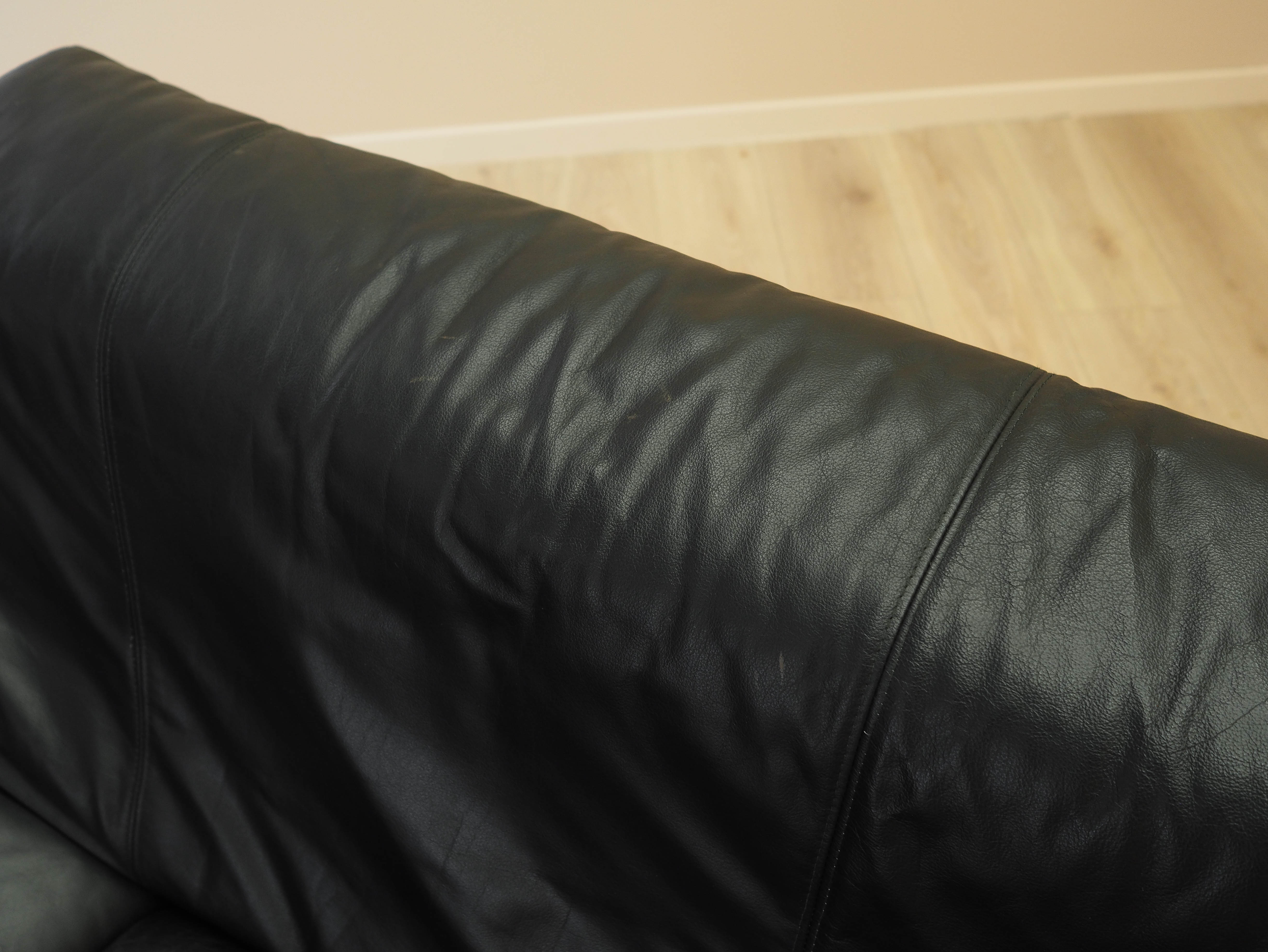 Black leather sofa 1960s
