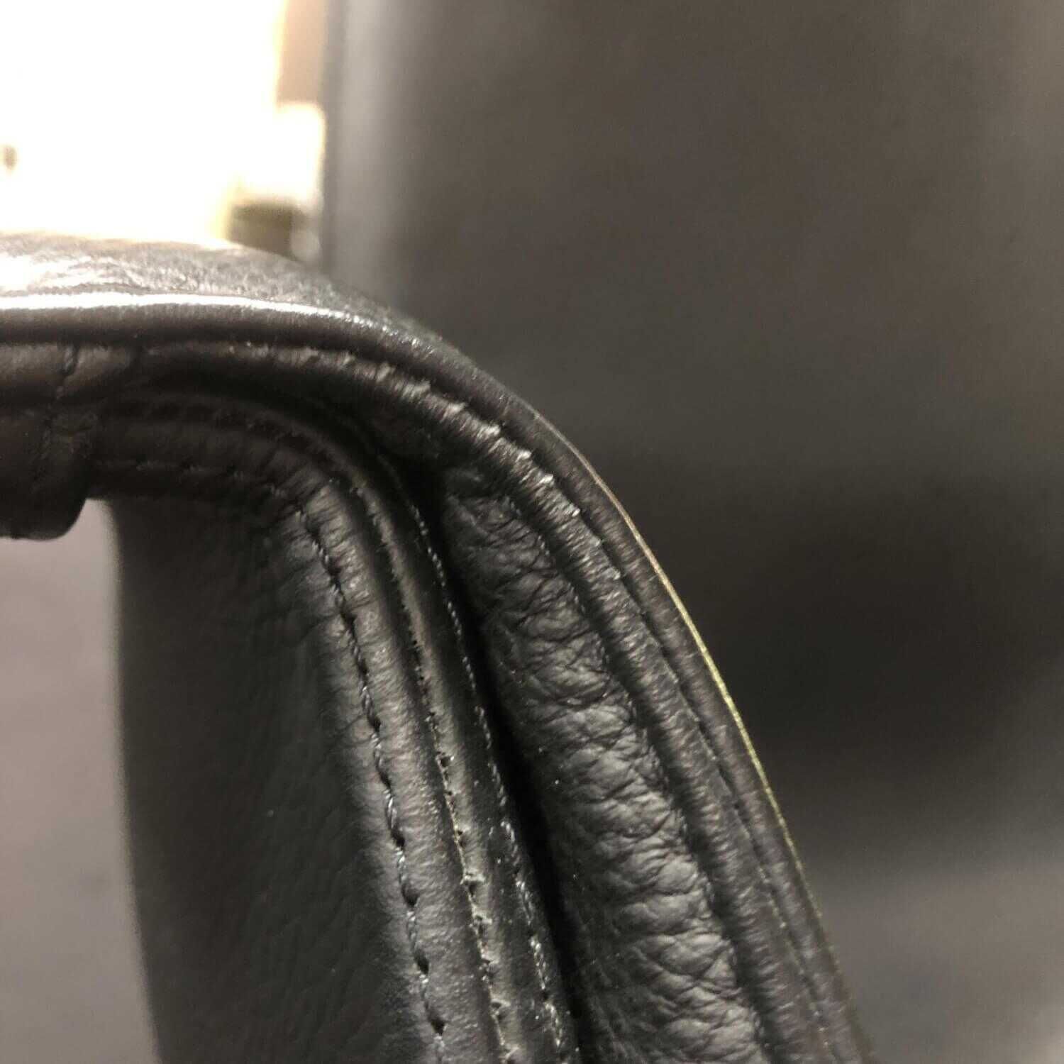 FK Schalensessel Leder 65 Schwarz Aluminium Kreuzfuß