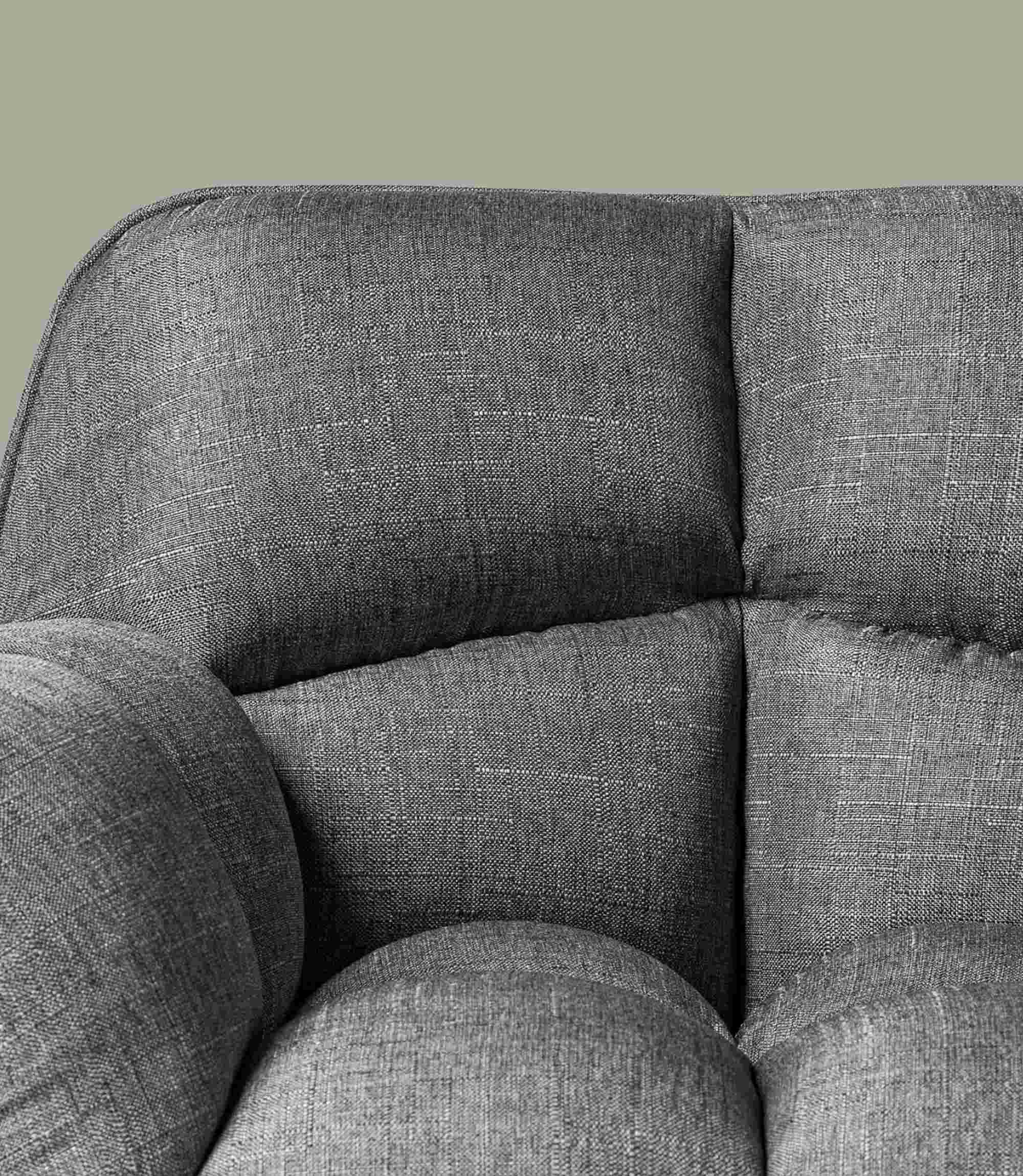 Armchair made of woven fabric in grey
