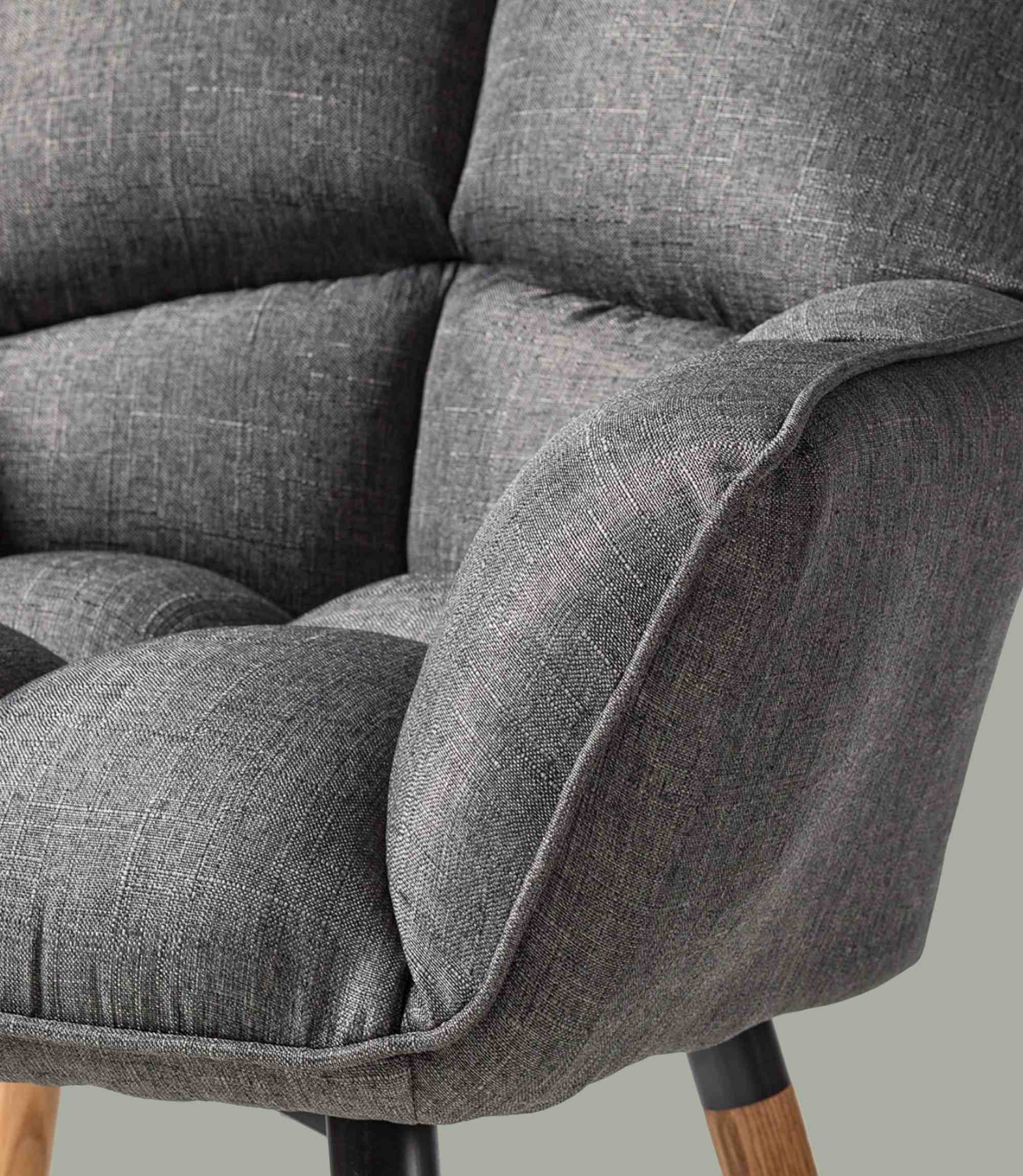 Armchair made of woven fabric in grey
