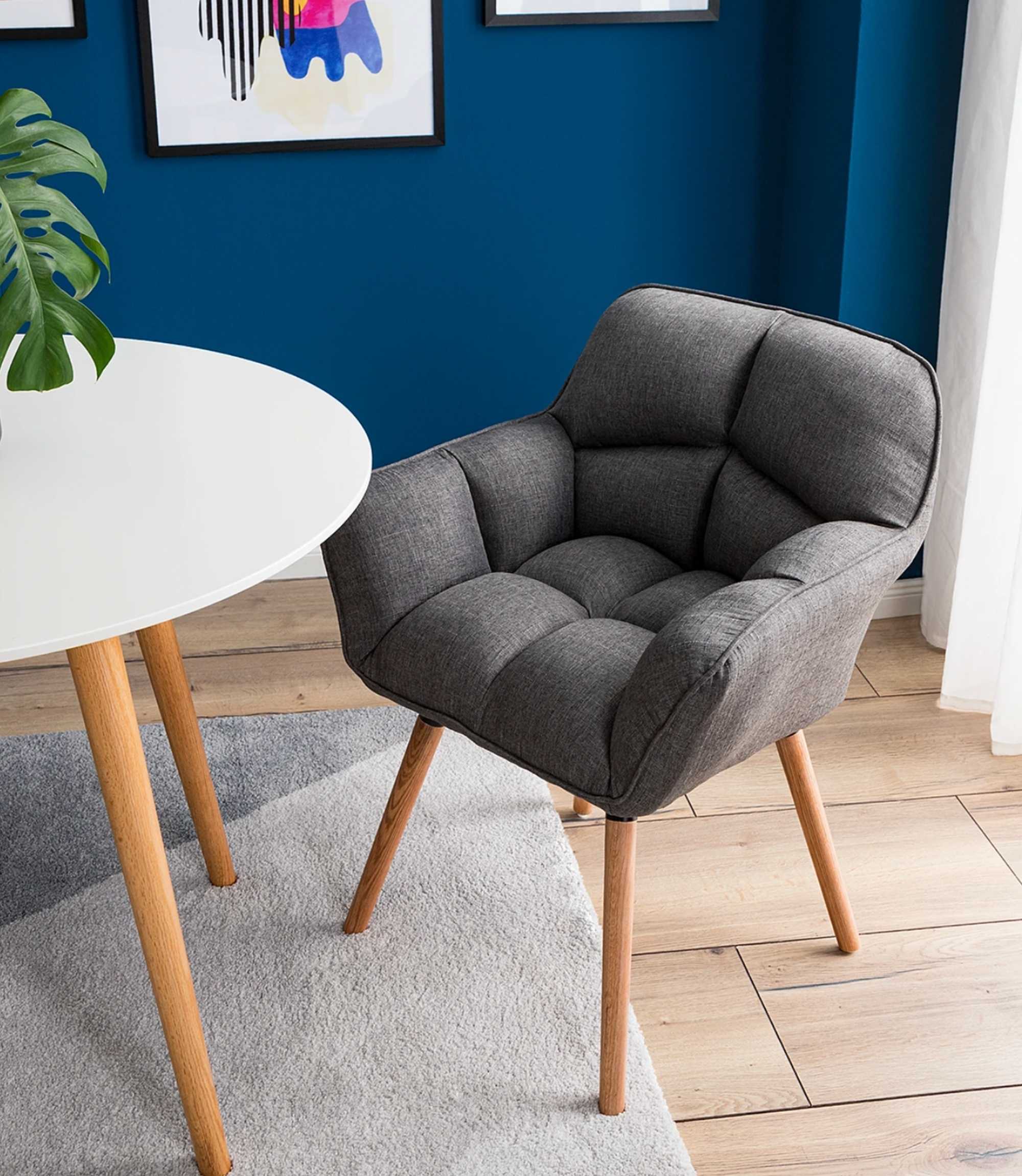 Armchair made of woven fabric in grey