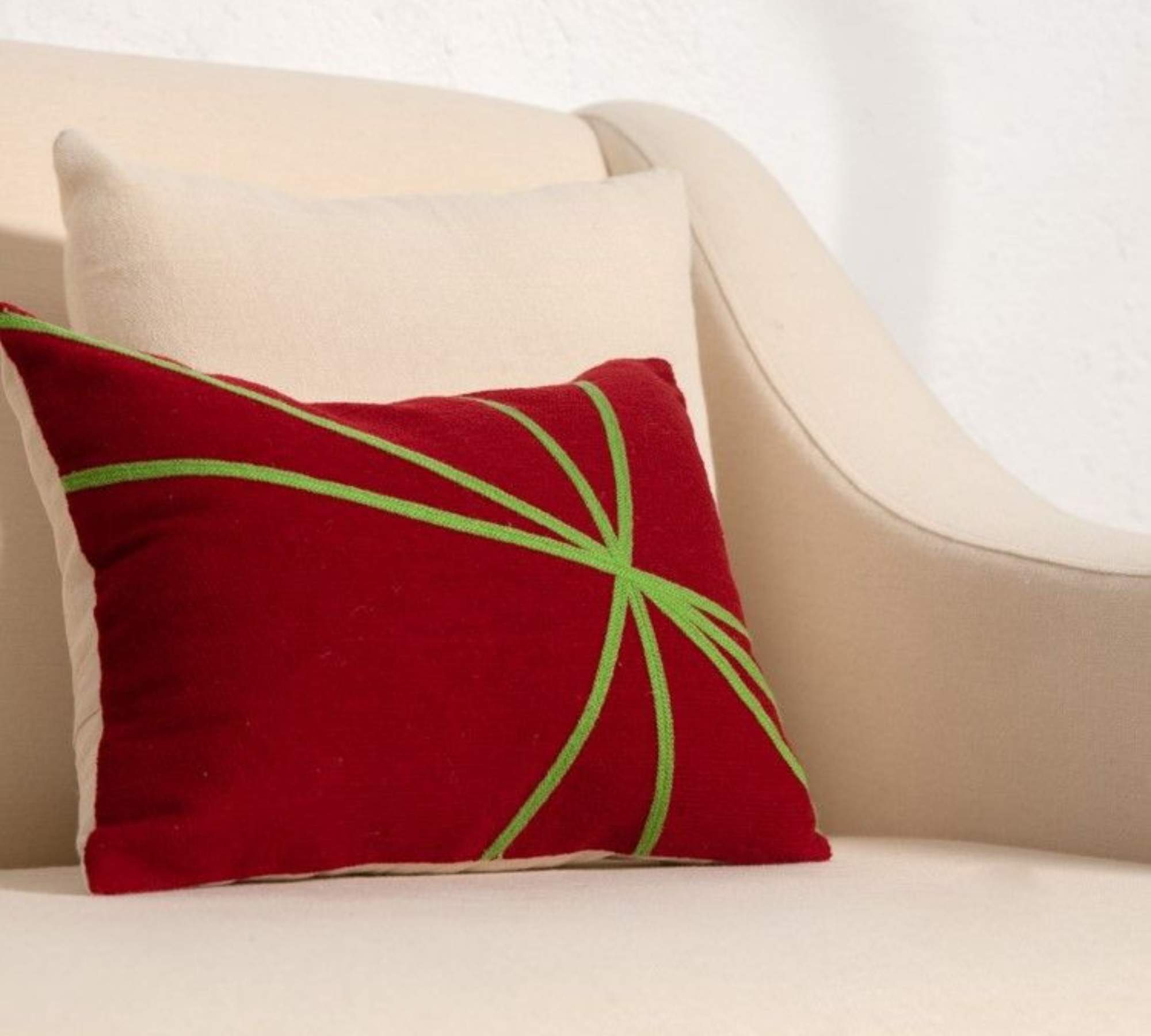 Embroidered cotton cushion with feather filling Red