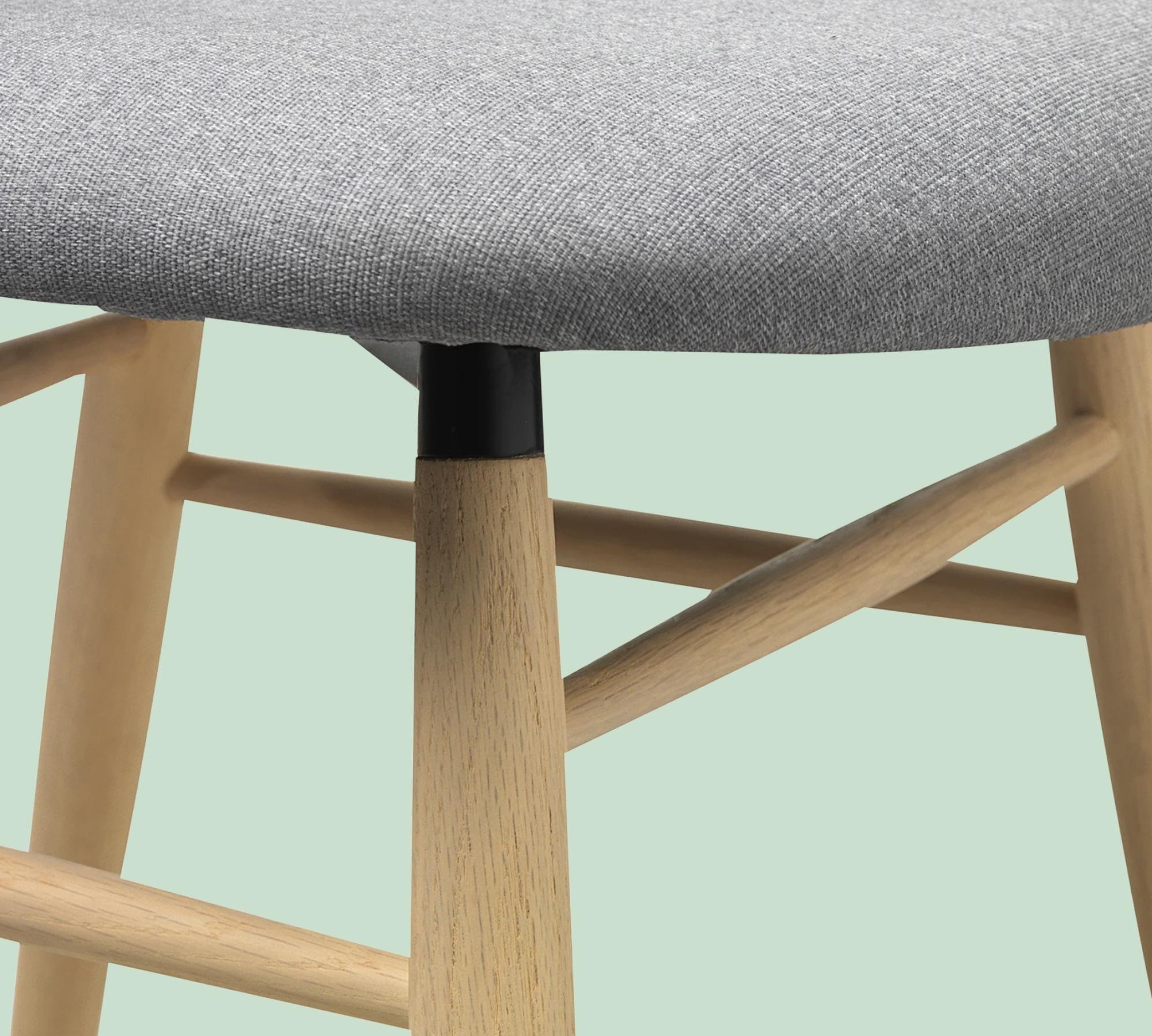 Upholstered chair with solid oak frame