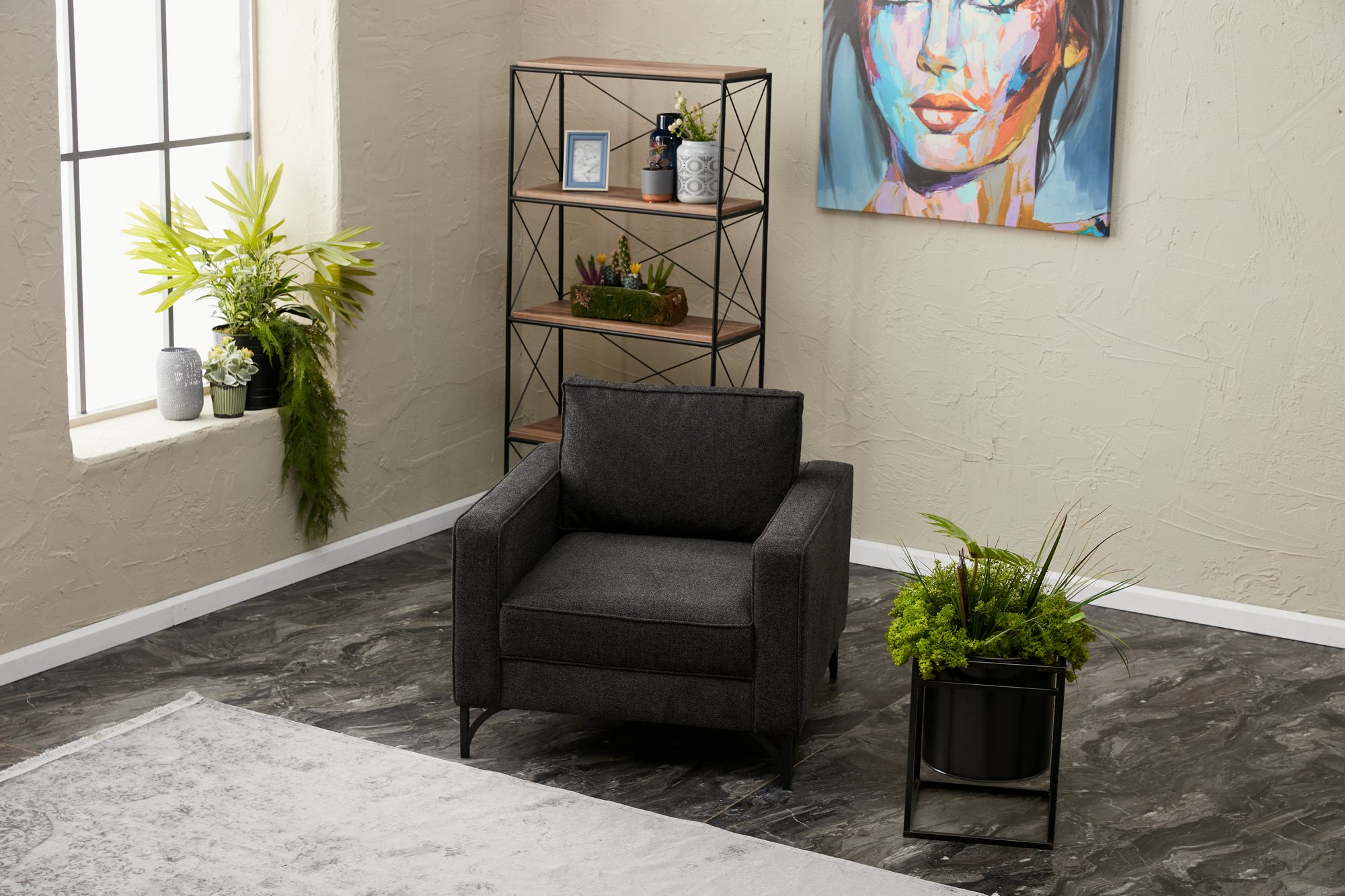 Lima armchair anthracite with black legs