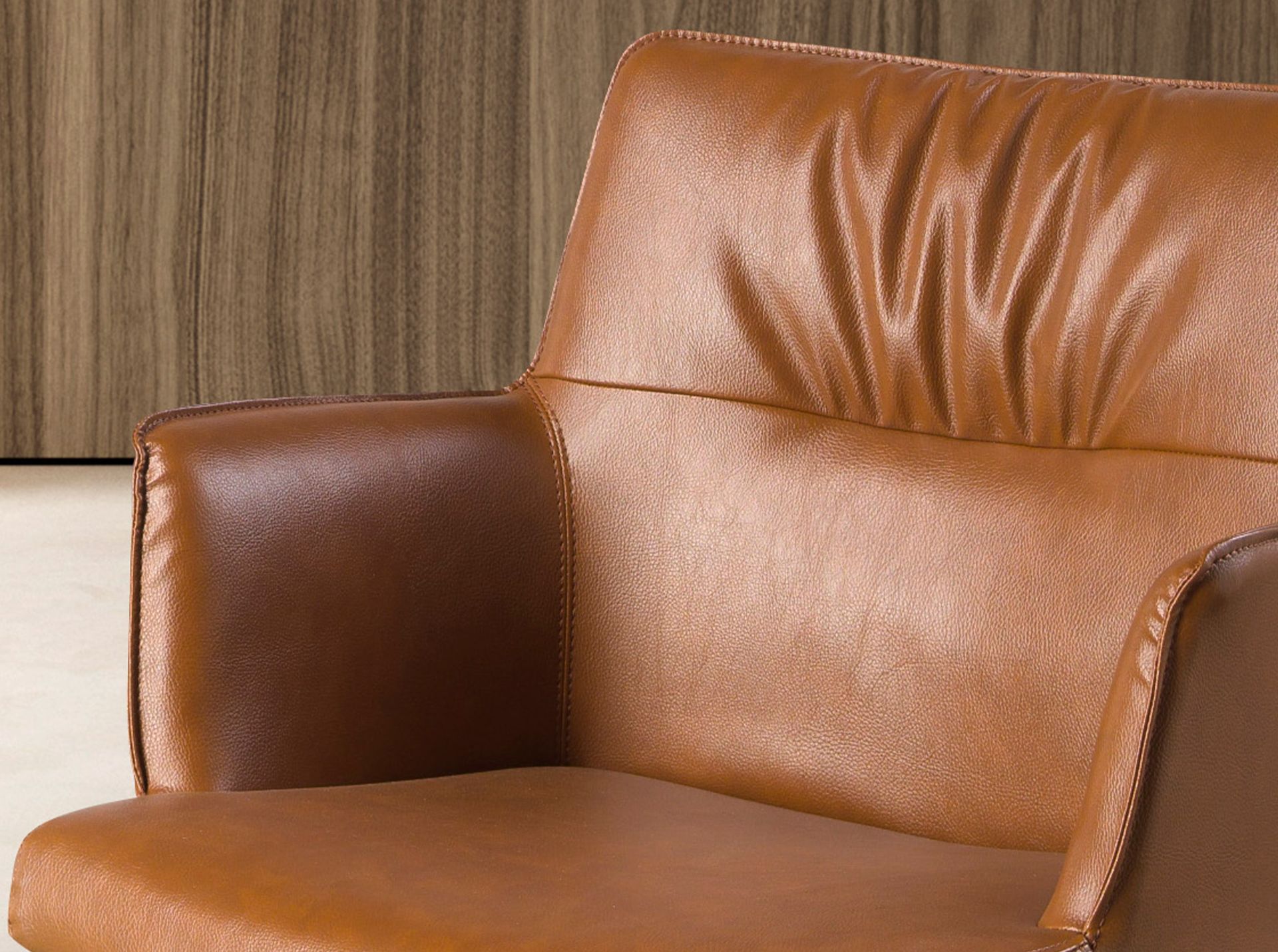 Swiveling chair faux leather brown