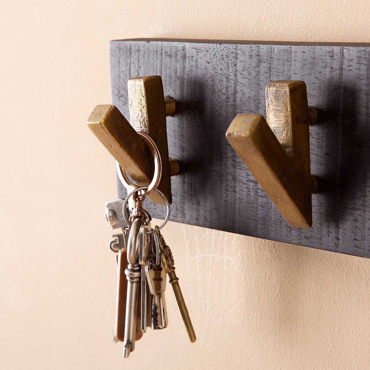 Massive Garderobenleiste Tahbar Mango Schwarz Gold