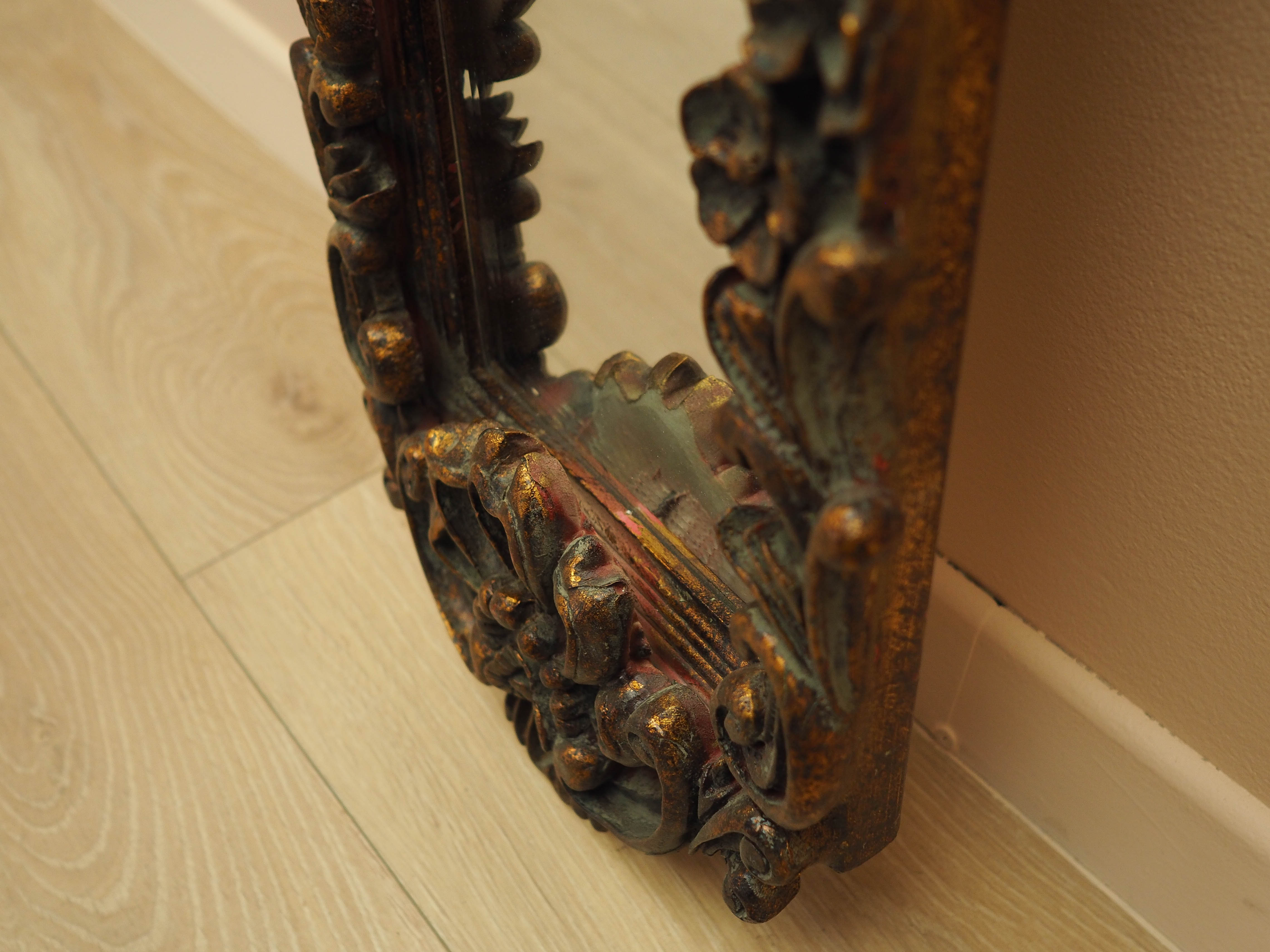 Mirror with wooden frame