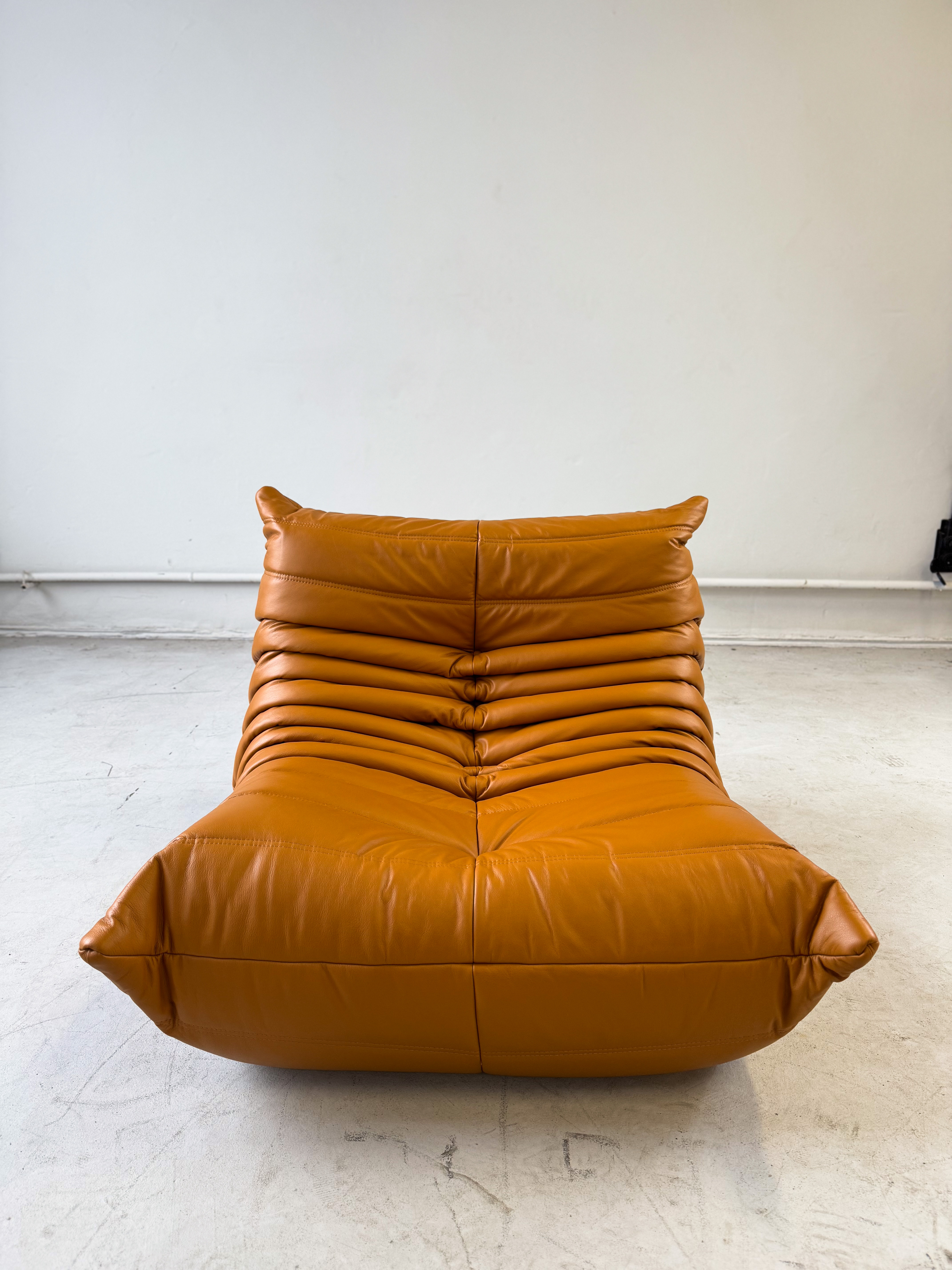 Togo armchair and ottoman set high gloss leather cognac light