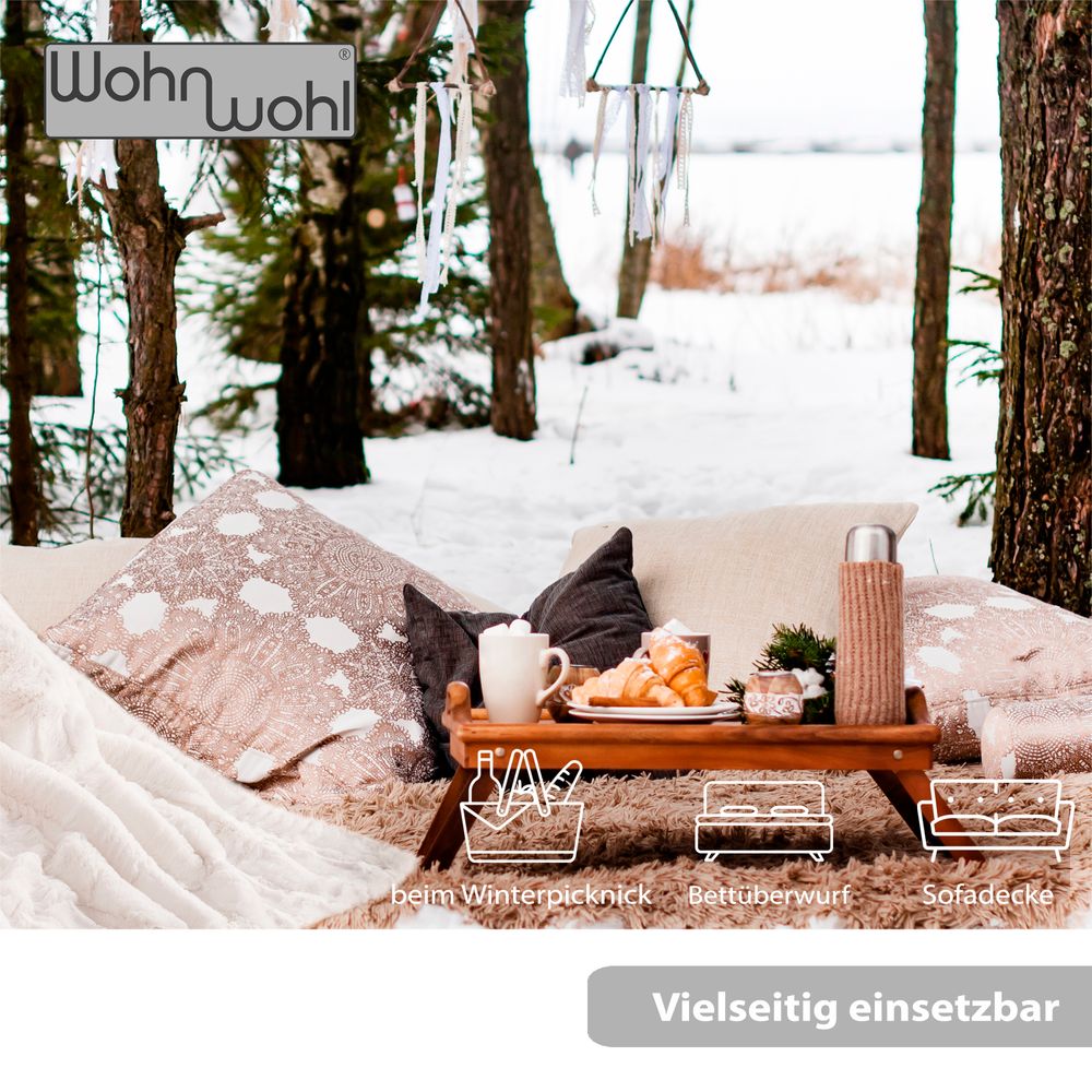 Couchdecke aus Fellimitat Creme