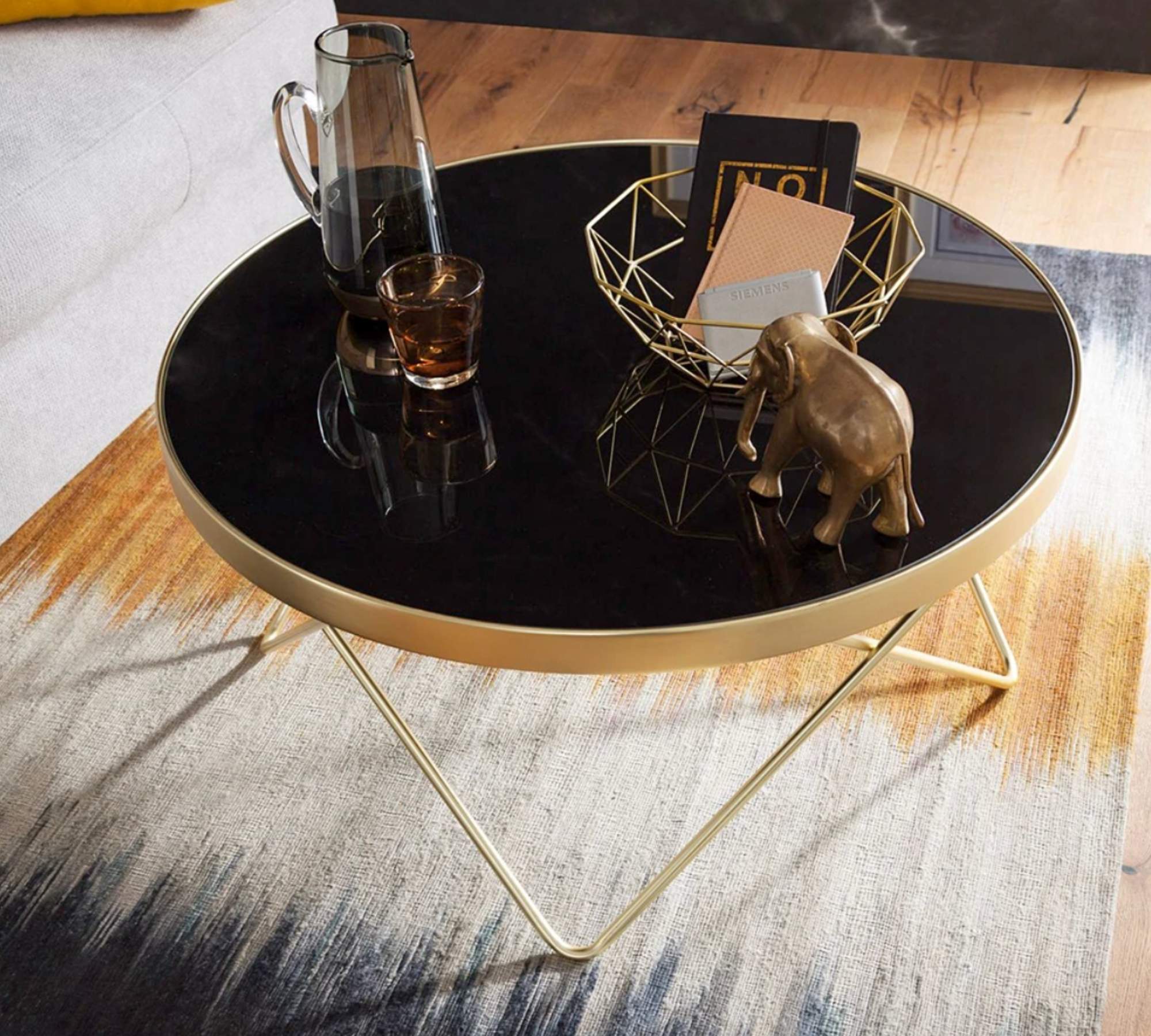 Geometrischer Couchtisch Gold mit schwarzer Tischplatte