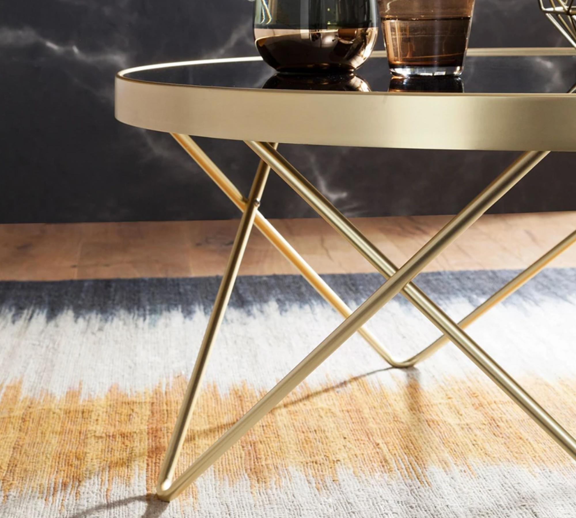 Geometrischer Couchtisch Gold mit schwarzer Tischplatte