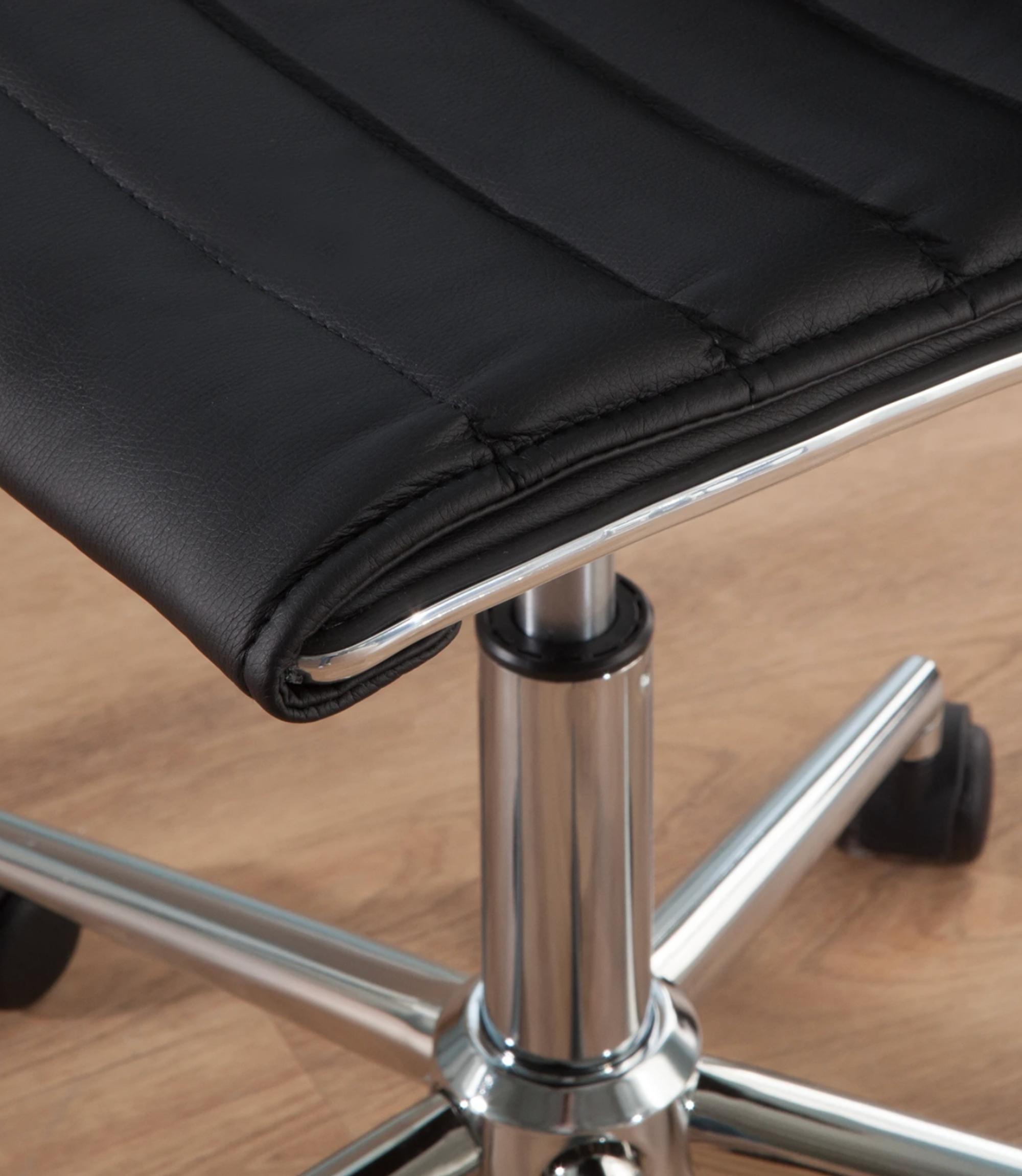Office swivel chair made of faux leather in black