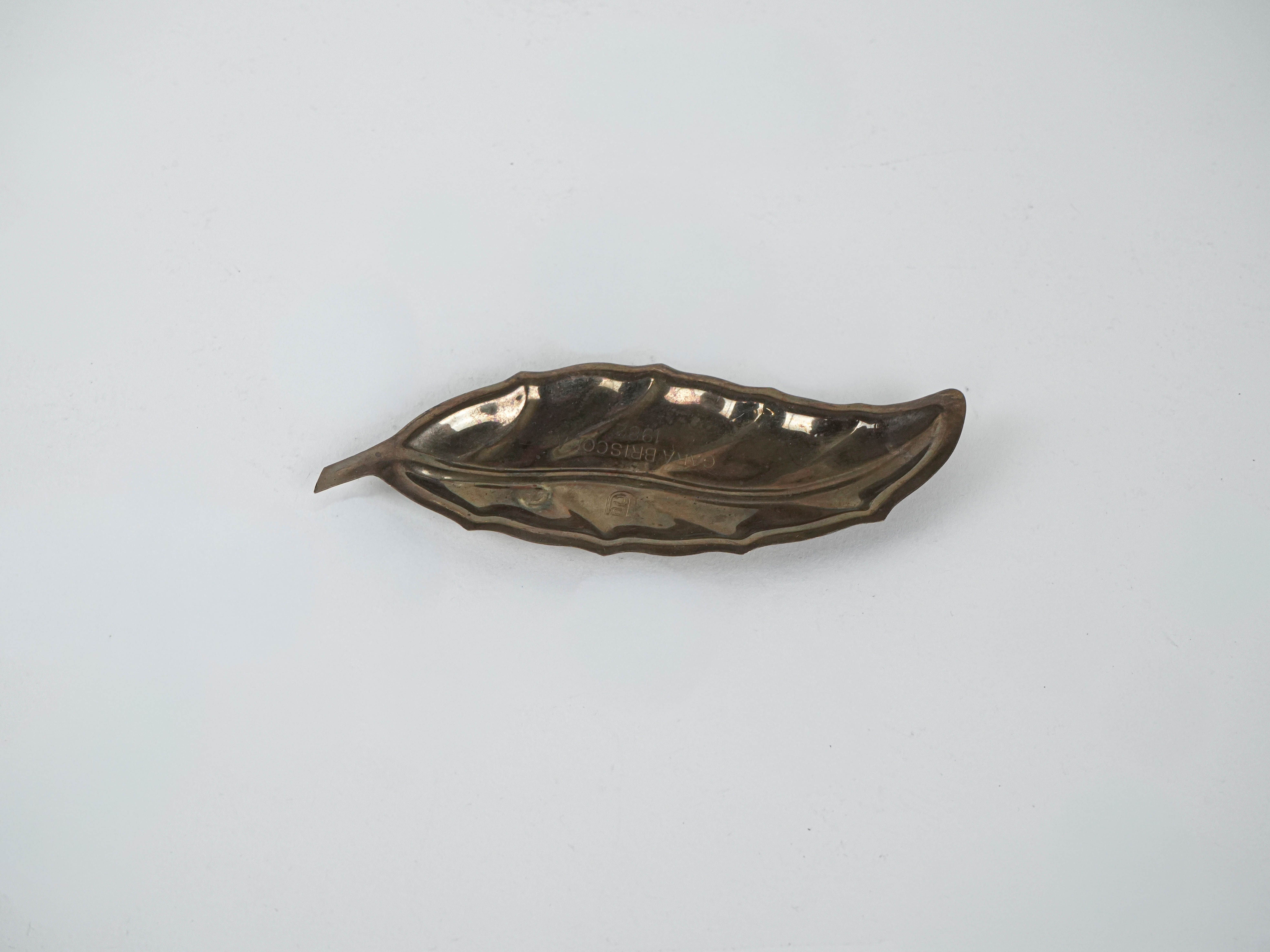 Metal plate in leaf shape 1980s