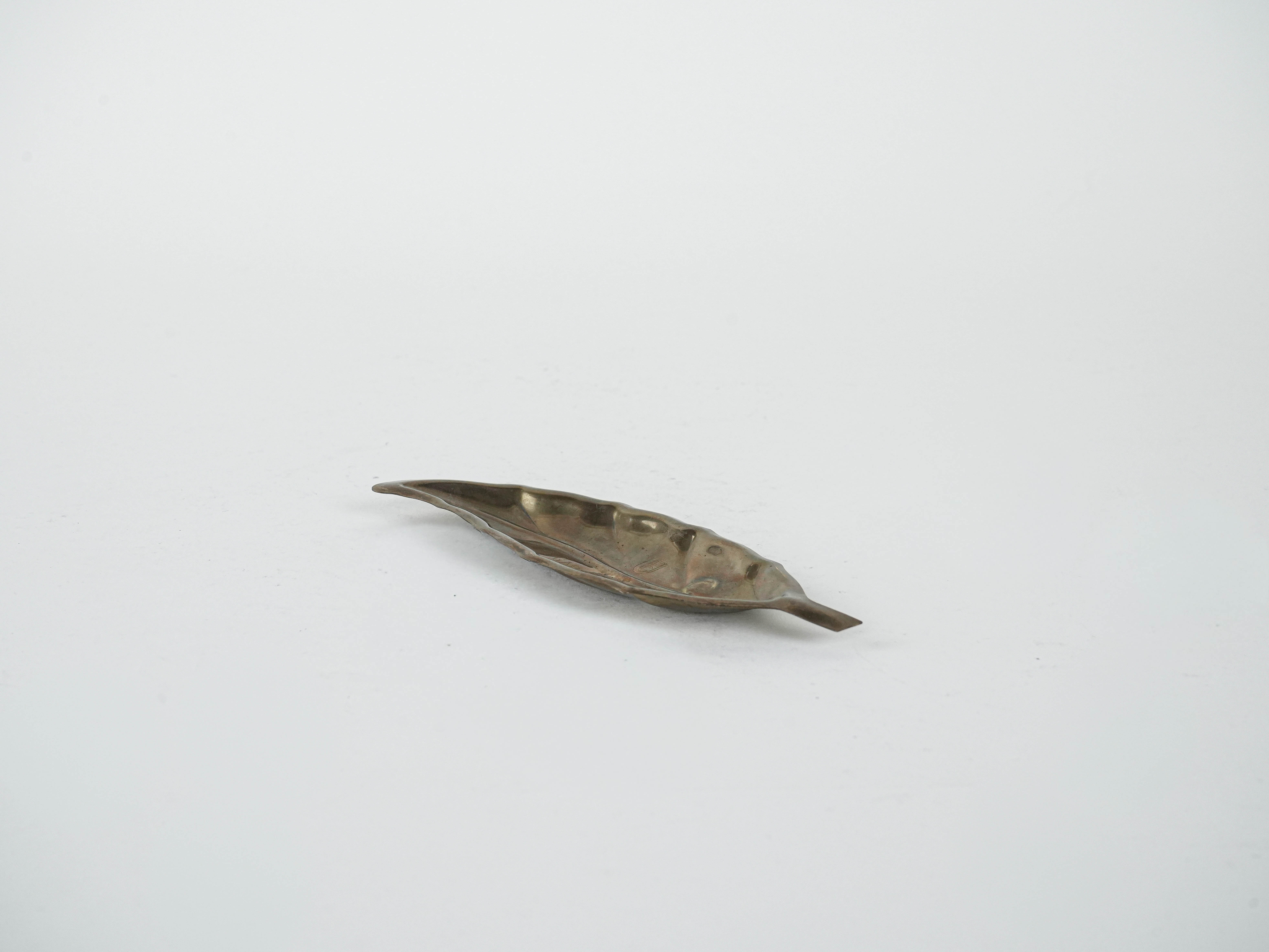 Metal plate in leaf shape 1980s