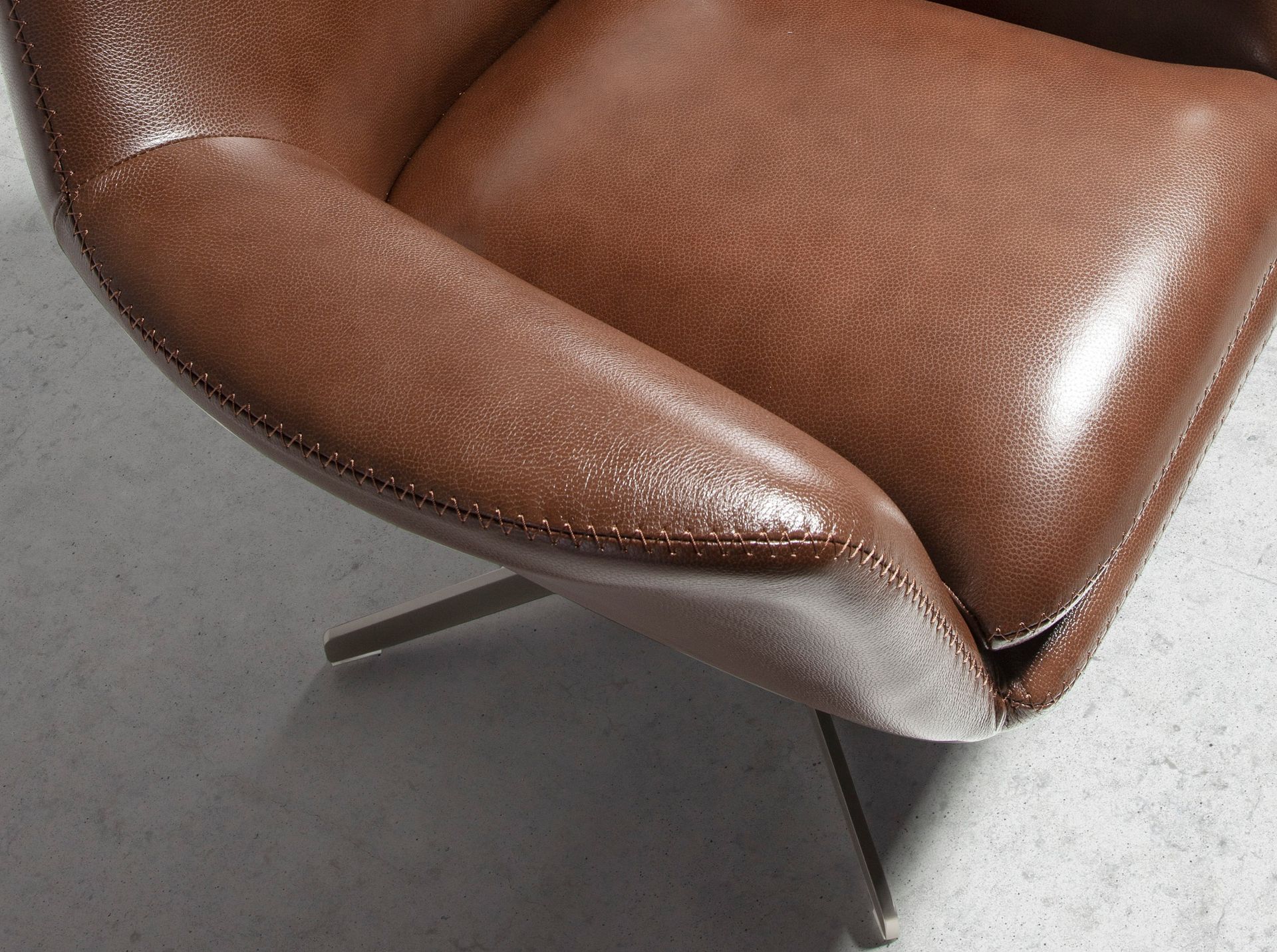 Cognac brown leather swivel armchair 5093