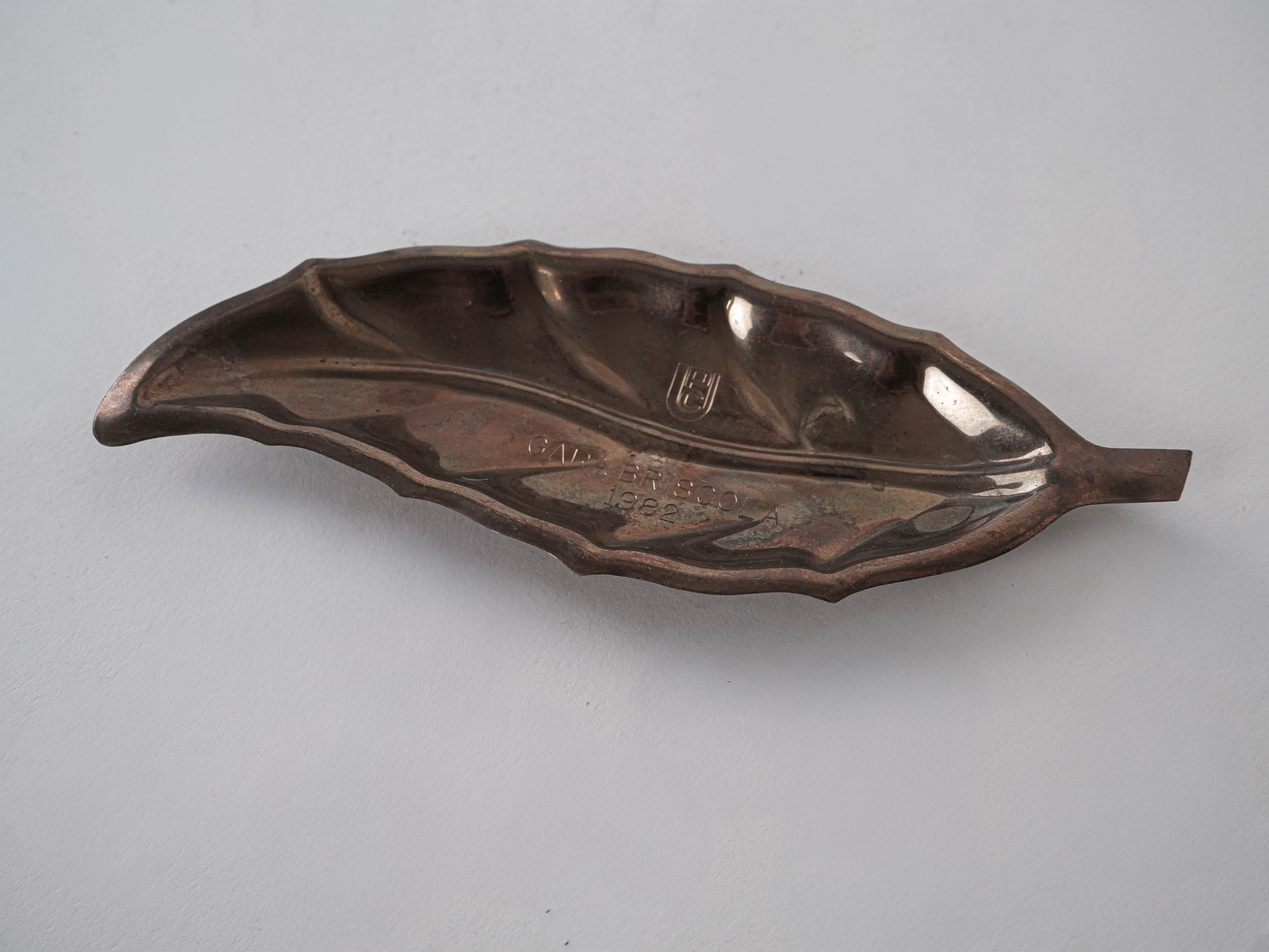 Metal plate in leaf shape 1980s
