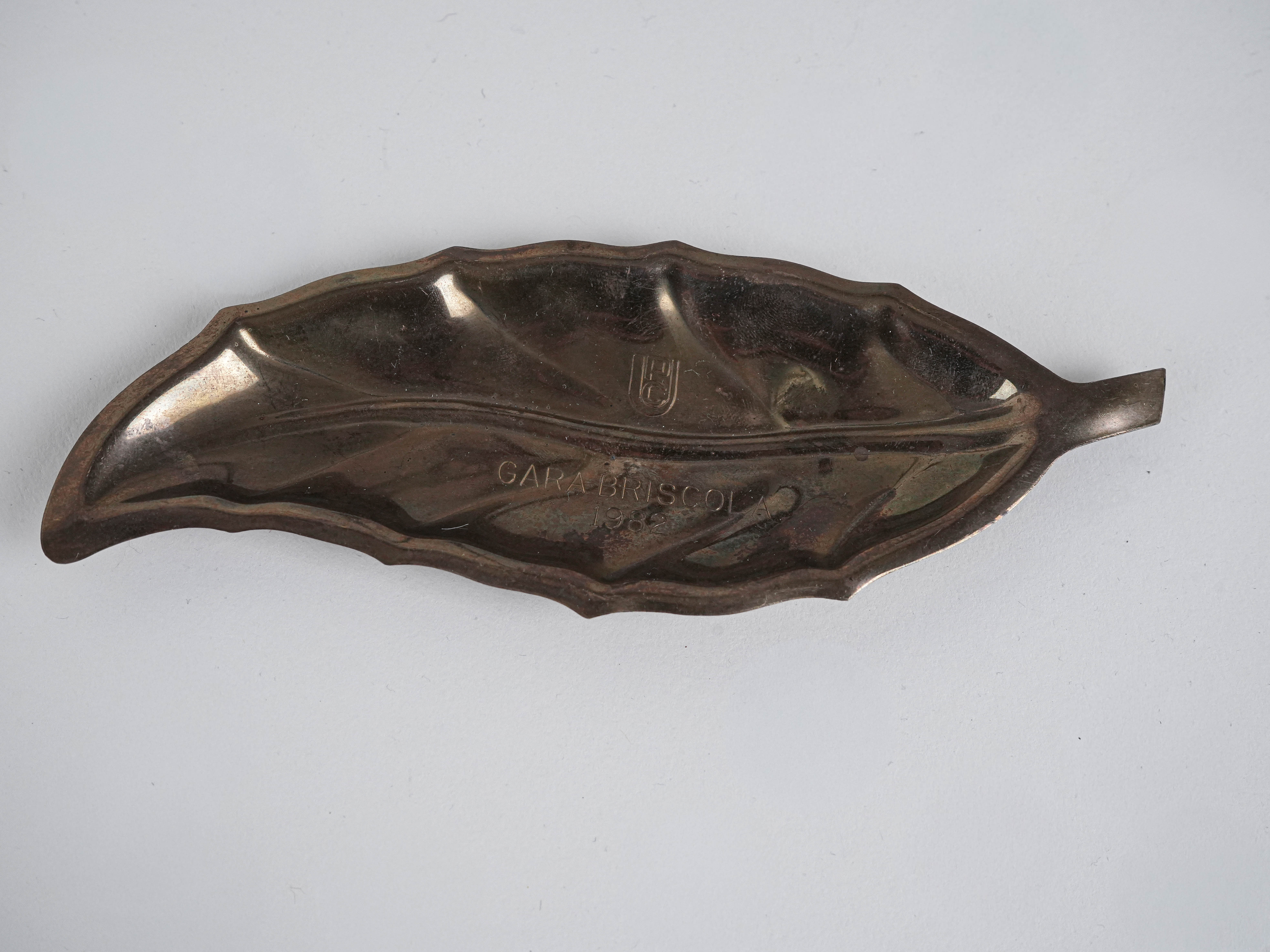 Metal plate in leaf shape 1980s