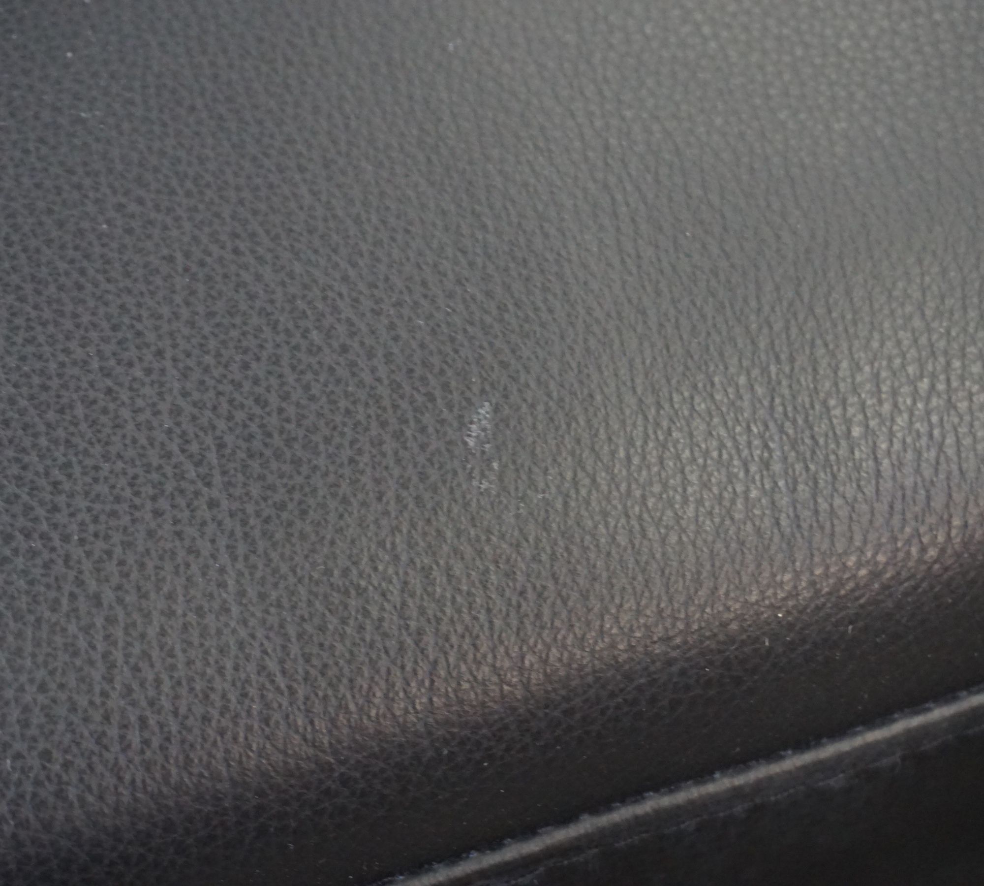 Indivi Ecksofa mit Ruhemodul & Hocker Salto-Leder