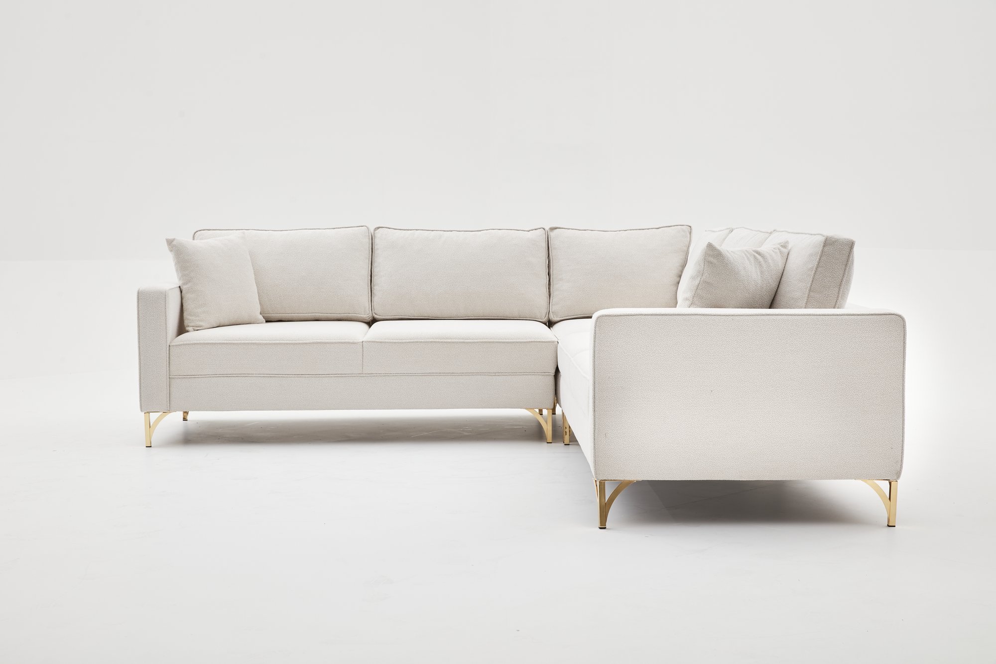 Lima Ecksofa 4-Sitzer Creme mit goldenen Beinen