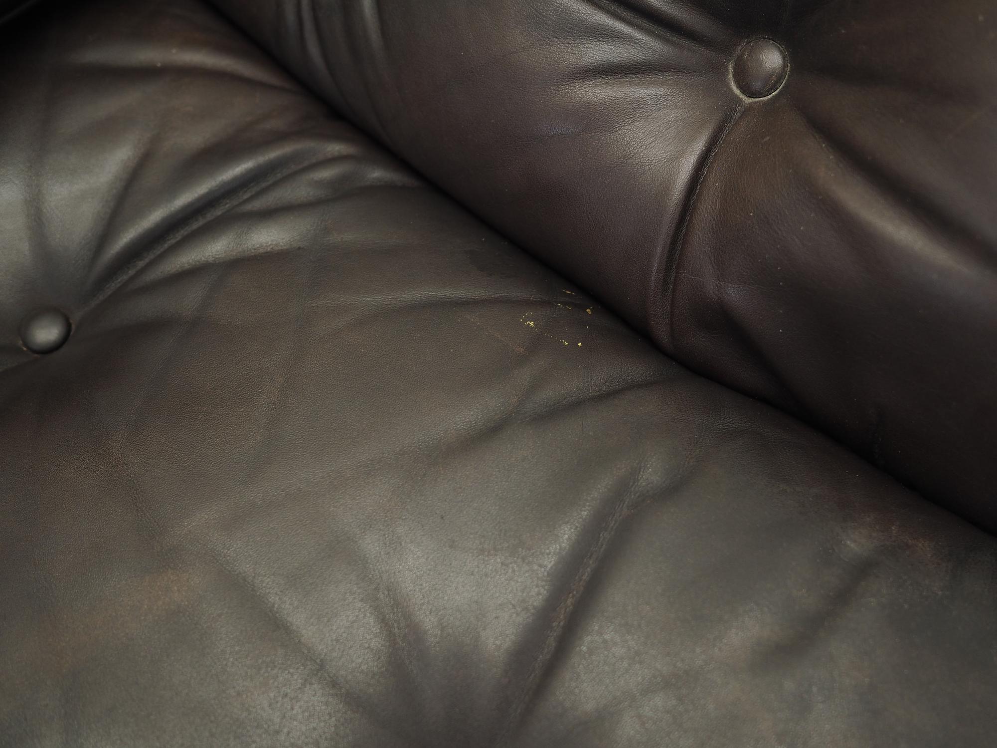Poltrona con rotelle in pelle marrone anni '70 14