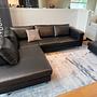 Indivi Ecksofa mit Ruhemodul & Hocker Salto-Leder Schwarz 1