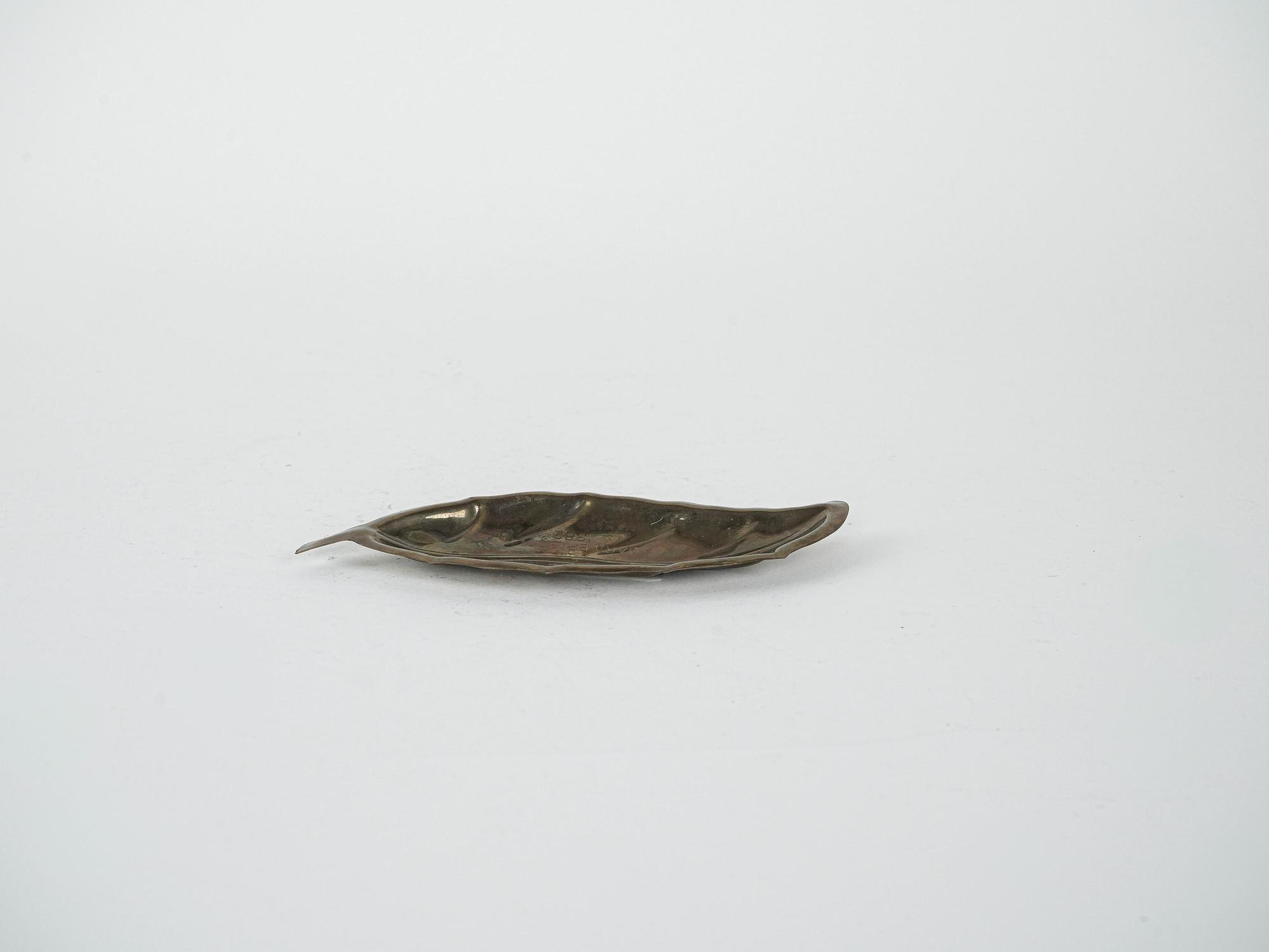 Metal plate in leaf shape 1980s 1