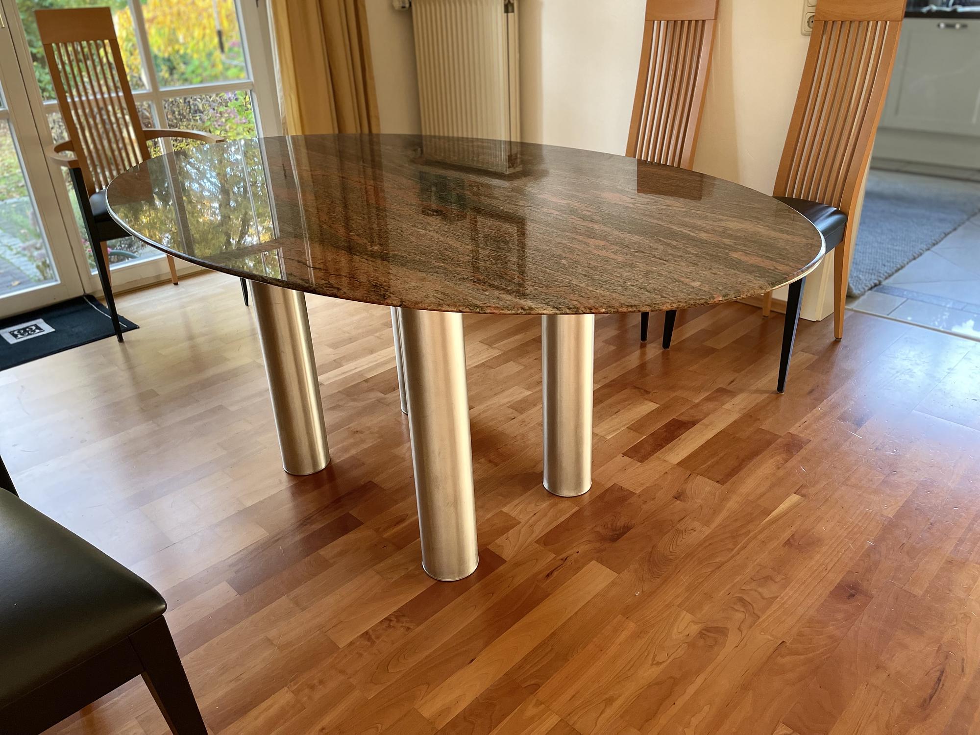 Dining table with oval granite top 1