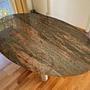 Dining table with oval granite top 3