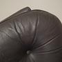 Poltrona con rotelle in pelle marrone anni '70 12