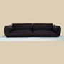 Sofa Jalis von COR Schwarz mit Ton in Ton Muster auf Podest 0