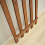 Teak wall coat rack 1970s 13